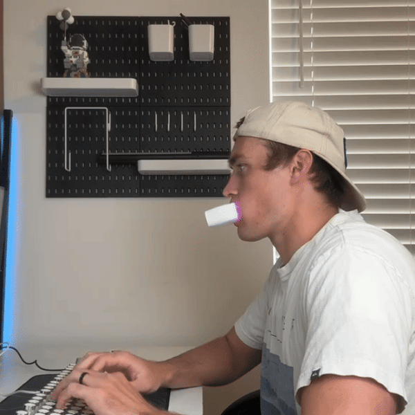 GlowBite 360™ – Hands-Free U-Shape Tooth Cleaner with Sonic Vibration & Blue-Light Whitening